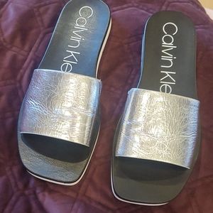 Calvin Klein silver slides, size 8